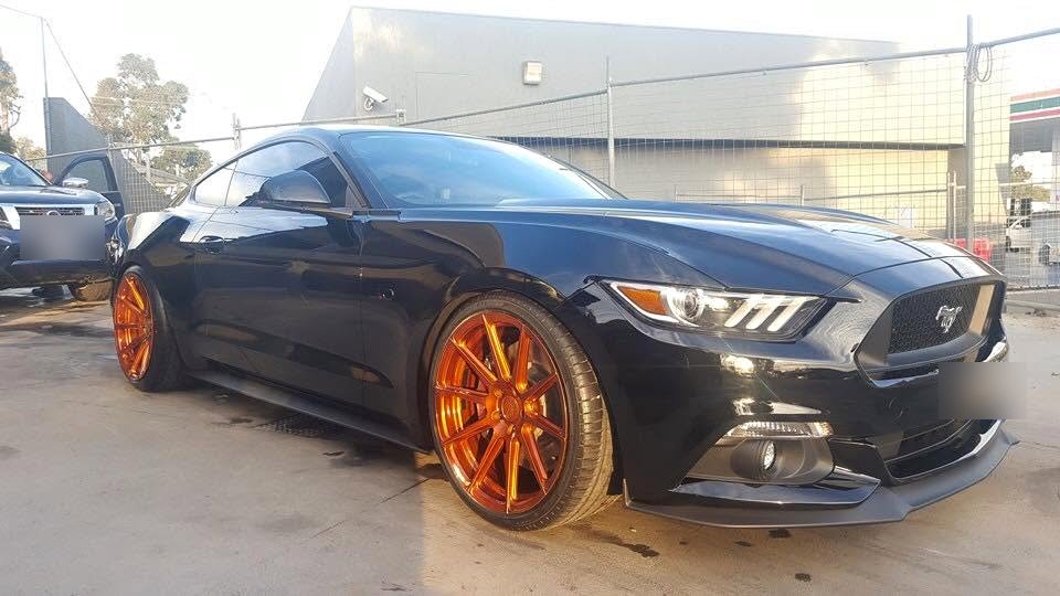 Gleaming black Ford Mustang after a detail at our Fremantle bay